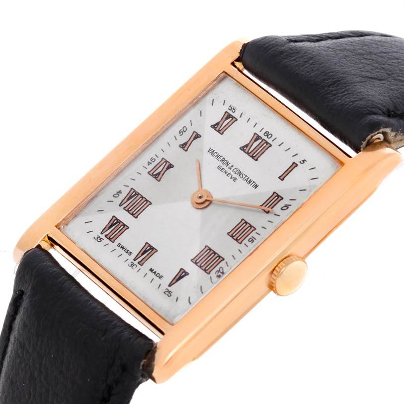 This image shows a close-up angled view of a Vintage Vacheron Constantin watch, highlighting its rectangular dial and leather strap.