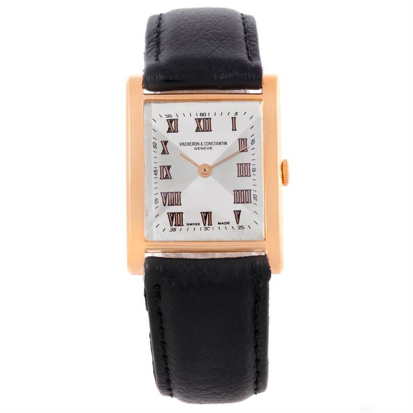 This image shows a frontal view of a Vintage Vacheron Constantin watch with a rectangular face and a black leather strap.