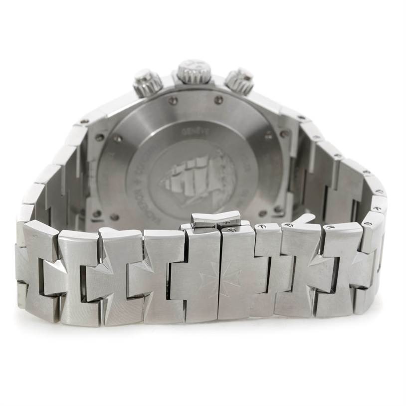 The image shows the back view of the Vacheron Constantin Overseas 49150.B01A.9097 Men's Stainless Steel Black Dial 49150.B01A.9097 Men's Stainless Steel Black Dial watch, focusing on the case back and part of the bracelet.