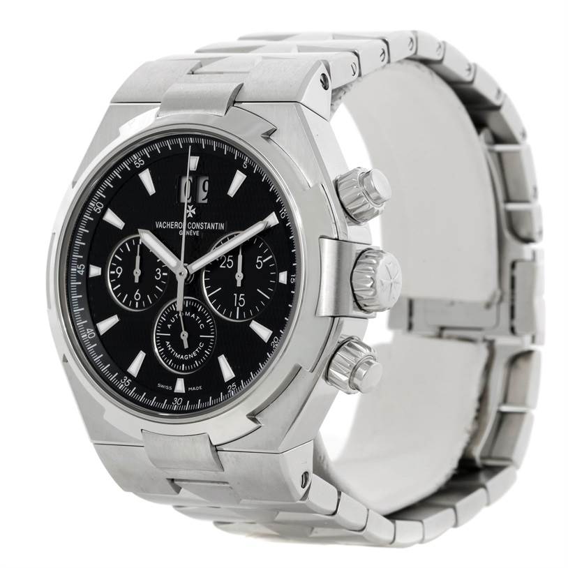 This Vacheron Constantin Overseas 49150.B01A.9097 Men's Stainless Steel Black Dial 49150.B01A.9097 Men's Stainless Steel Black Dial watch is shown at an angle highlighting its face, side buttons, and bracelet.