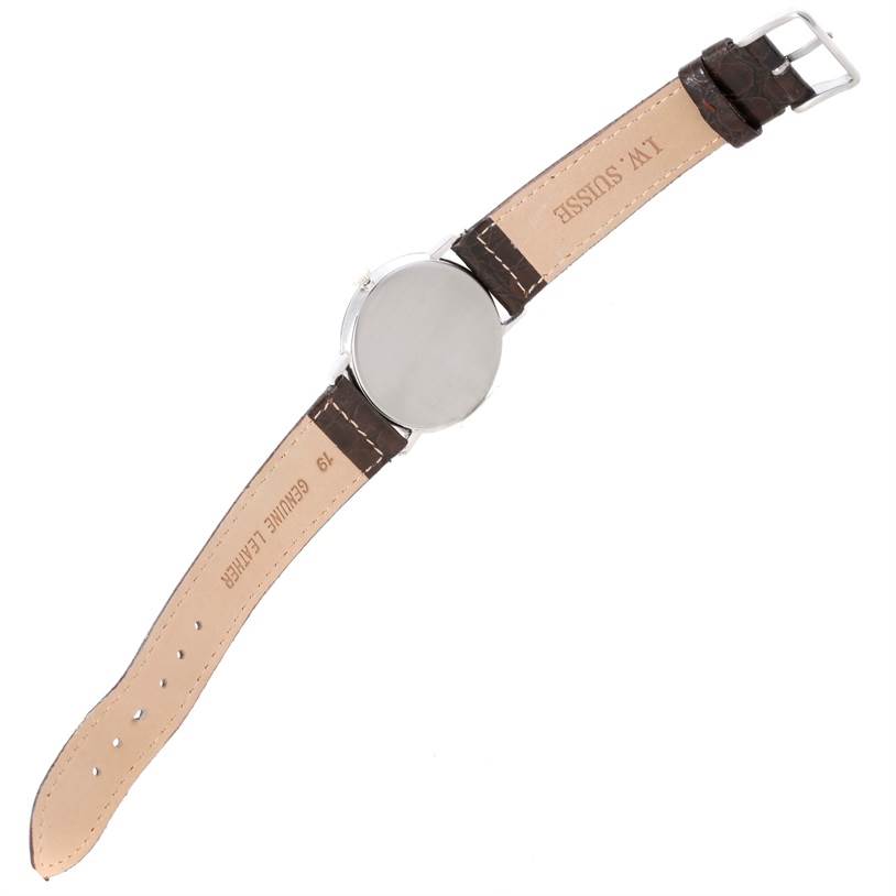 This image shows the rear view of a Vintage Vacheron Constantin watch, displaying the back of the case and leather straps.