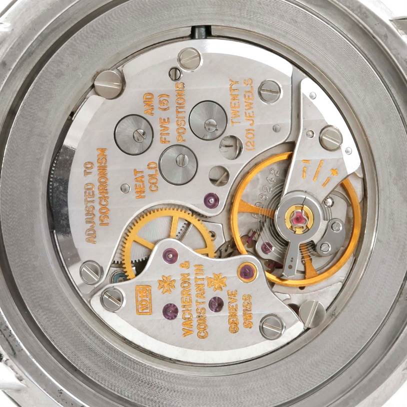 The image shows the intricate inner mechanical movements of a Vintage Vacheron Constantin watch from a close-up, rear angle.
