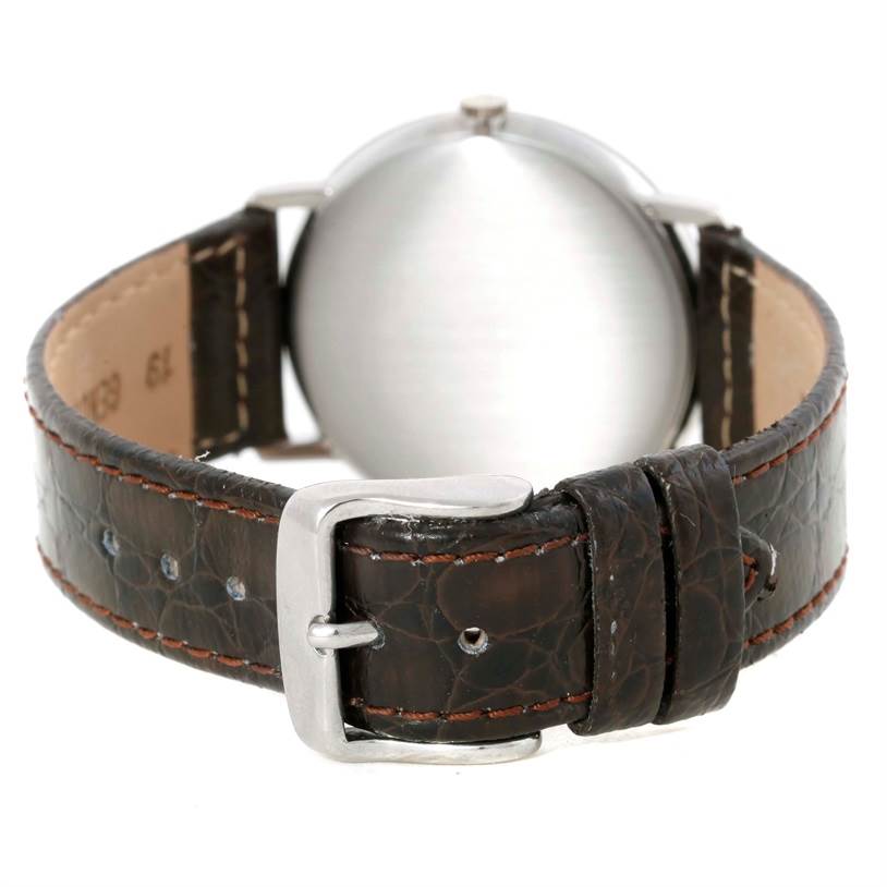 This image shows the back view of a Vintage Vacheron Constantin watch, featuring its leather strap and buckle.