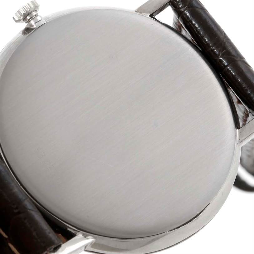 The image shows the back case and crown of a Vintage Vacheron Constantin watch from a close-up angle.