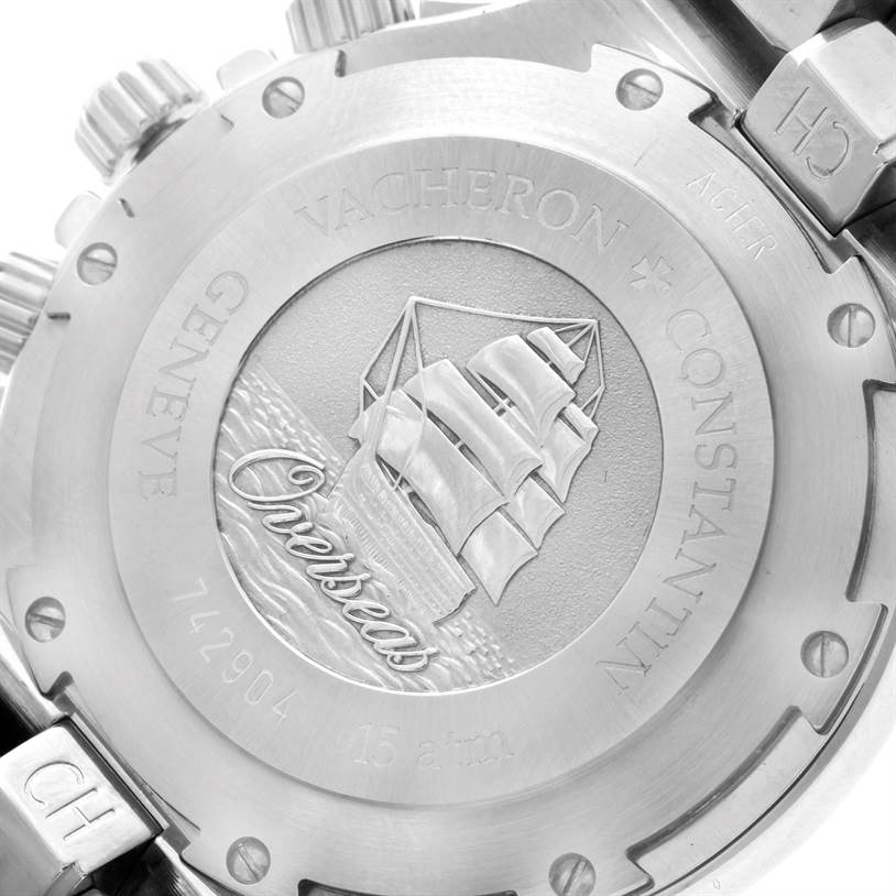 The image shows the case back of the Vacheron Constantin Overseas 49140/423A-8790 Men's Stainless Steel Silver Dial 49140/423A-8790 Men's Stainless Steel Silver Dial model, featuring an engraved ship and brand markings.