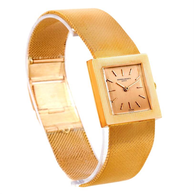 The image shows a front and side view of a Vintage Vacheron Constantin watch, highlighting its rectangular face and gold mesh strap.