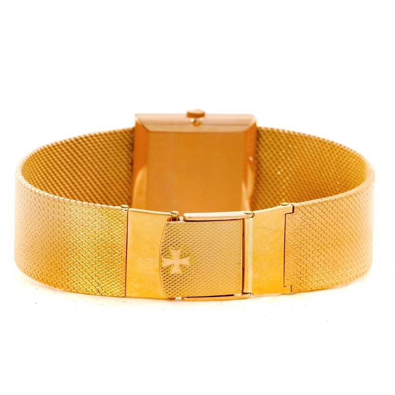 This image shows the back clasp and band of a Vintage Vacheron Constantin watch, featuring a gold mesh bracelet.