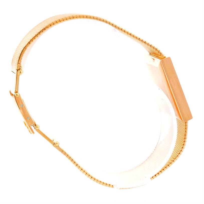 The image shows a side view of a Vintage Vacheron Constantin watch, highlighting its clasp and gold bracelet.