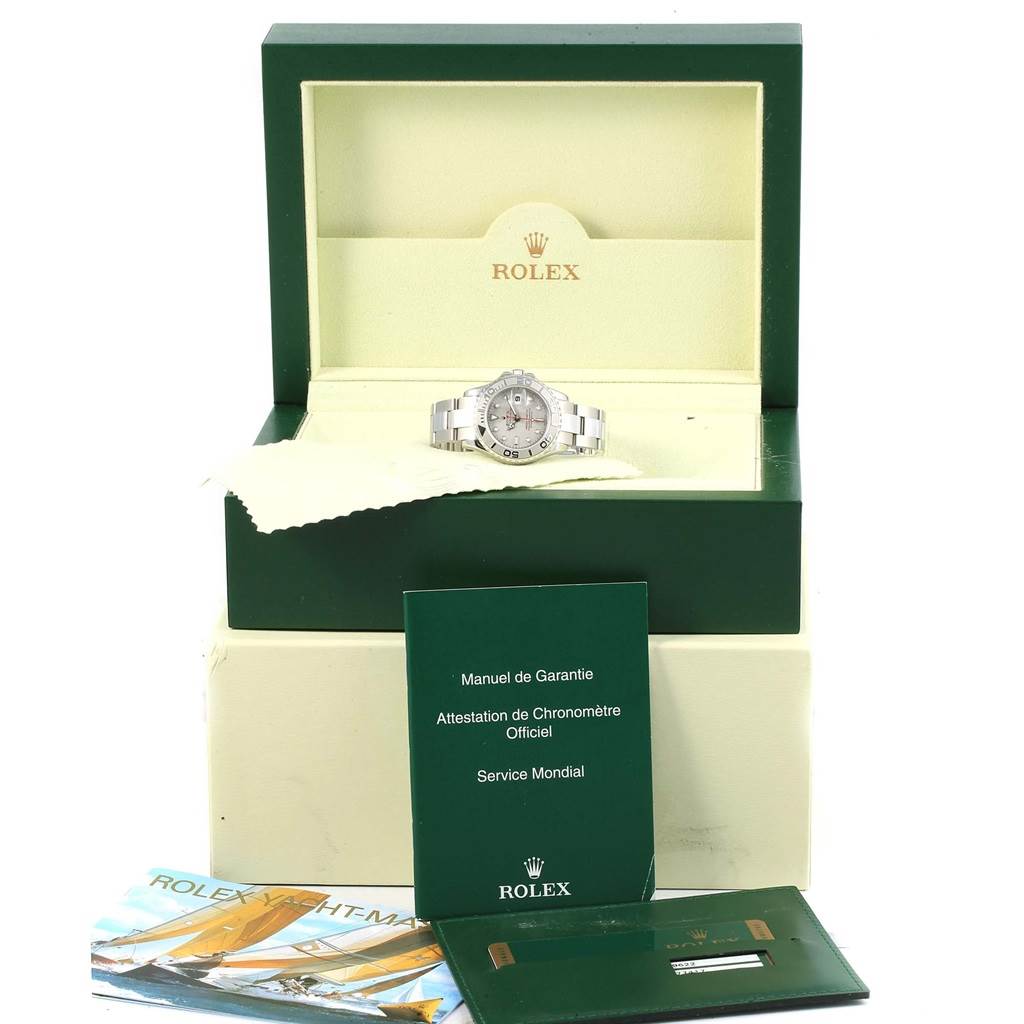 The image shows a Rolex Yacht-Master 169622 Women's Stainless Steel Silver Dial 169622 Women's Stainless Steel Silver Dial watch displayed in its open box with manuals and accessories in front.