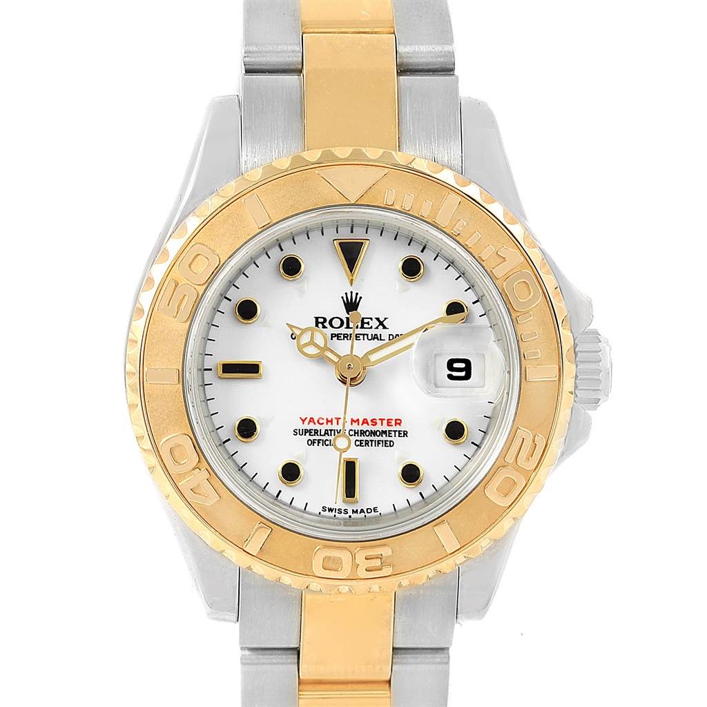 The image shows a front view of a Rolex Yacht-Master 169623 Women
s Steel and Gold (two tone) White Dial 169623 Women
s Steel and Gold (two tone) White Dial watch, highlighting its dial, bezel, and part of the bracelet.