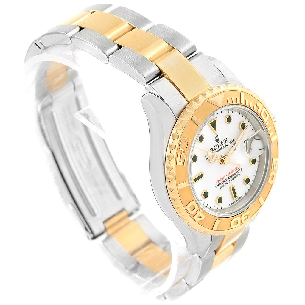 This image shows a side angle view of the Rolex Yacht-Master 169623 Women
s Steel and Gold (two tone) White Dial 169623 Women
s Steel and Gold (two tone) White Dial watch, highlighting the gold and silver bracelet and the watch face.