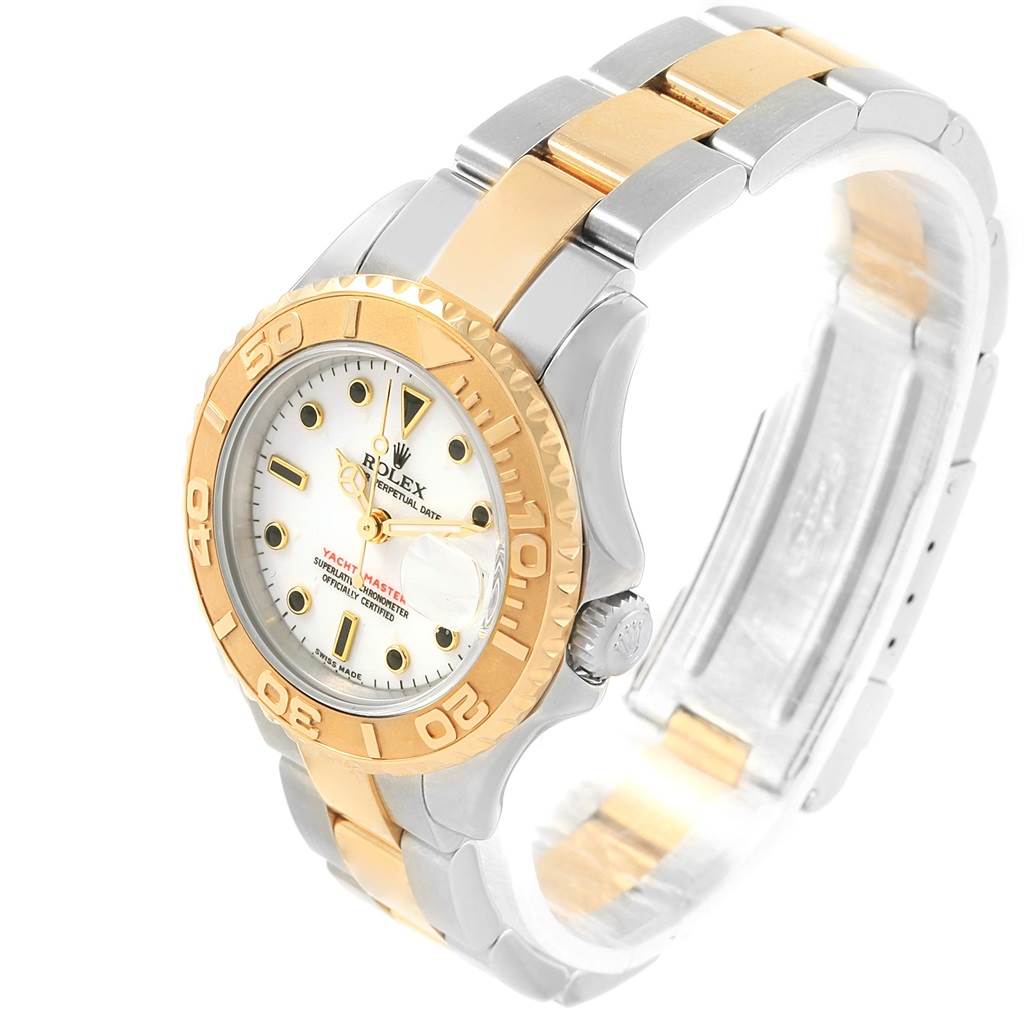 The Yacht-Master model by Rolex is shown at an angle, highlighting its dial, bezel, and bracelet.