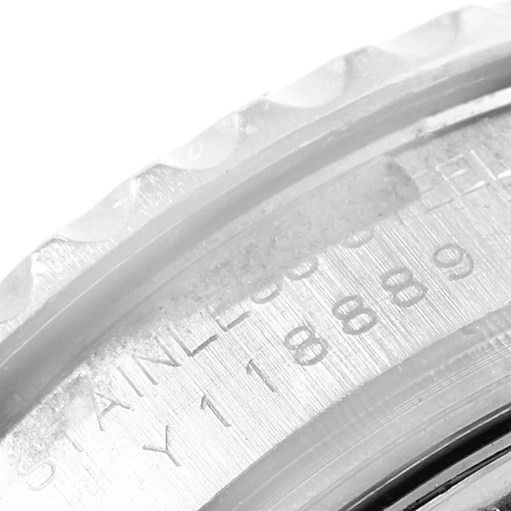 The image shows a close-up view of the engraved edge and bezel of a Rolex Yacht-Master 169622 Women's Stainless Steel Silver Dial 169622 Women's Stainless Steel Silver Dial watch.