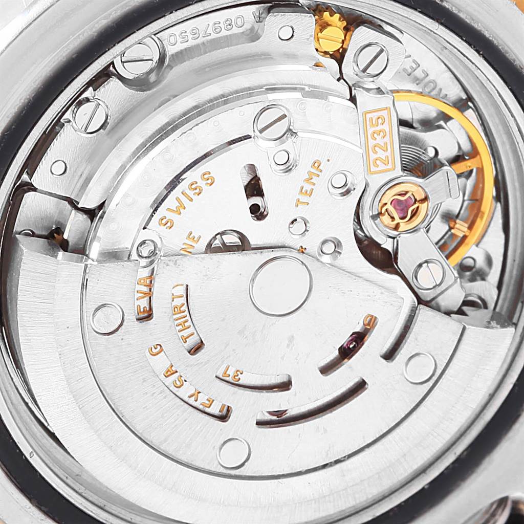This image shows a close-up view of the internal movement mechanism of a Rolex Yacht-Master 169623 Women
s Steel and Gold (two tone) White Dial 169623 Women
s Steel and Gold (two tone) White Dial watch.