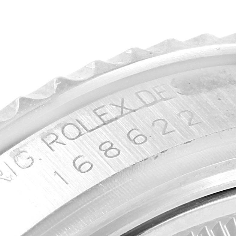 The image shows a close-up of the bezel and serial number engraving on a Rolex Yacht-Master 168622 Stainless Steel Silver Dial 168622 Stainless Steel Silver Dial watch.