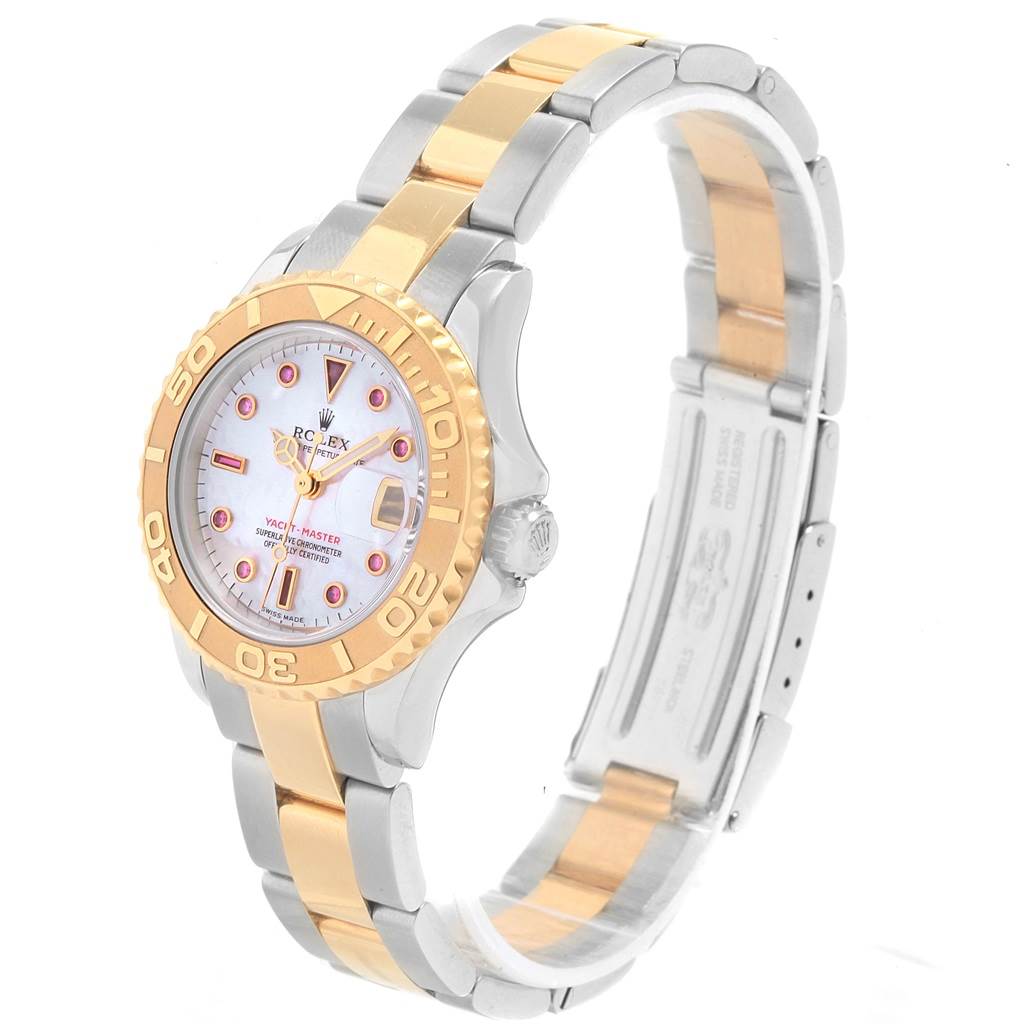 This Rolex Yacht-Master 169623 Women's Steel and Gold (two tone) Mother of Pearl Dial 169623 Women's Steel and Gold (two tone) Mother of Pearl Dial watch is shown from an angled side view, highlighting its bezel, dial, and part of the bracelet.