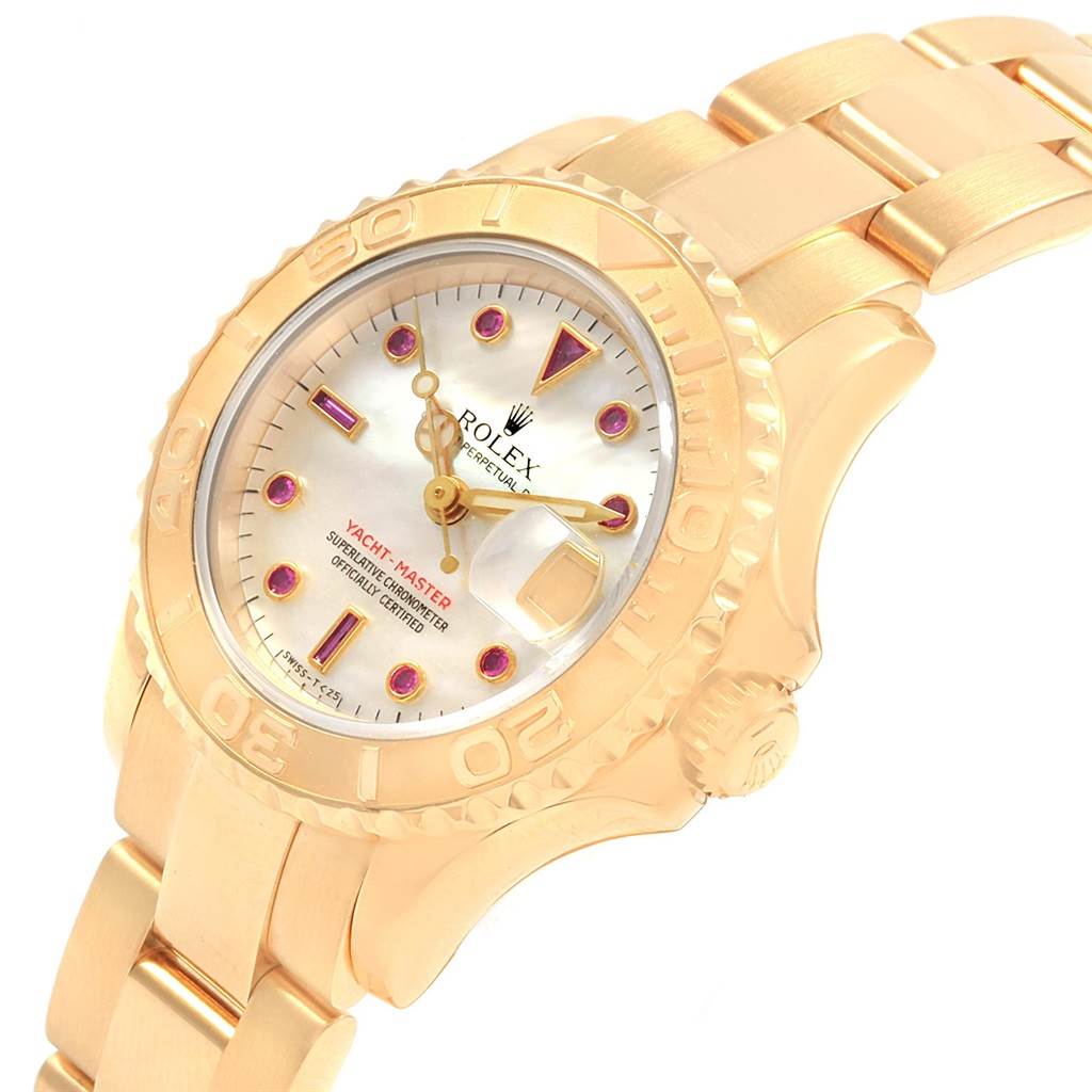 This image shows a Rolex Yacht-Master 69628 Women's Yellow Gold Mother of Pearl Dial 69628 Women's Yellow Gold Mother of Pearl Dial watch at a slight angle, displaying its bezel, dial, and bracelet links.