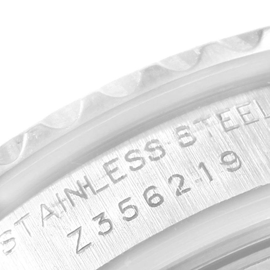 This image shows a close-up of the engraving on the side of the Rolex Yacht-Master 169622 Women's Stainless Steel Silver Dial 169622 Women's Stainless Steel Silver Dial watch case.
