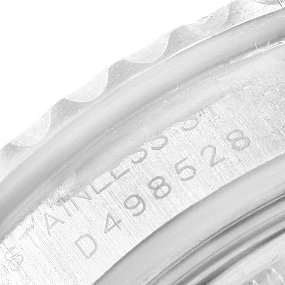 The image shows a close-up of the serial number engraving and part of the bezel of a Rolex Yacht-Master 169622 Women's Stainless Steel Silver Dial 169622 Women's Stainless Steel Silver Dial watch.