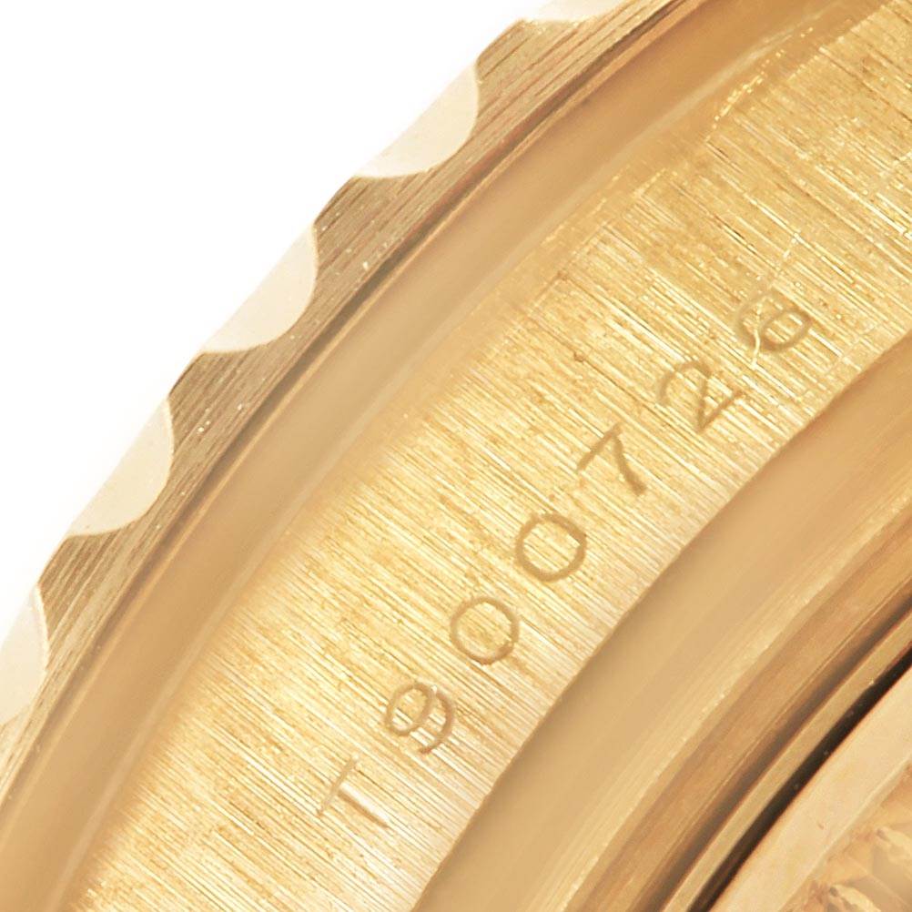 The image shows a close-up angle of the bezel and case of the Rolex Yacht-Master 69628 Women's Yellow Gold White Dial 69628 Women's Yellow Gold White Dial watch.