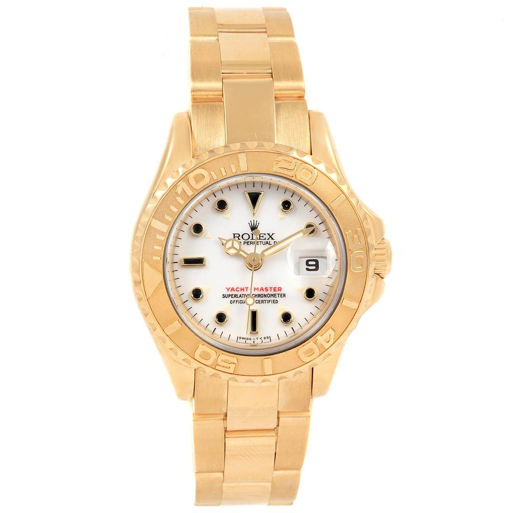 The image shows a front view of a Rolex Yacht-Master 69628 Women's Yellow Gold White Dial 69628 Women's Yellow Gold White Dial watch with a gold bracelet and a white dial.