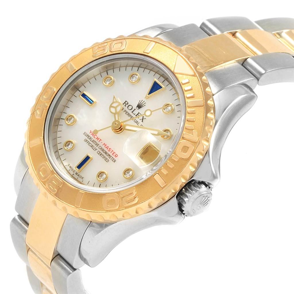This Rolex Yacht-Master 169623 Women's Steel and Gold (two tone) Mother of Pearl Dial 169623 Women's Steel and Gold (two tone) Mother of Pearl Dial watch is shown from a three-quarter angle, highlighting the face, bezel, and part of the bracelet.