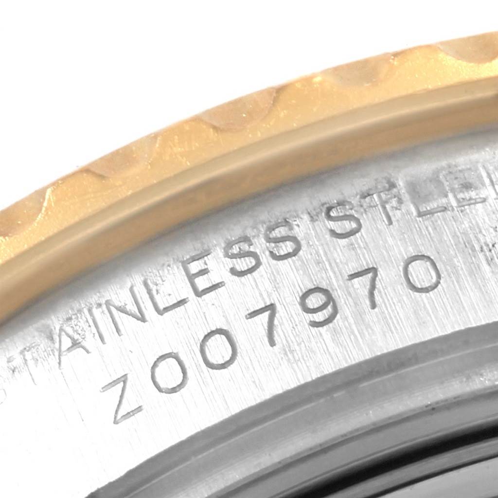 This close-up image showcases the bezel and part of the case back of a Rolex Yacht-Master 169623 Women's Steel and Gold (two tone) Mother of Pearl Dial 169623 Women's Steel and Gold (two tone) Mother of Pearl Dial watch.