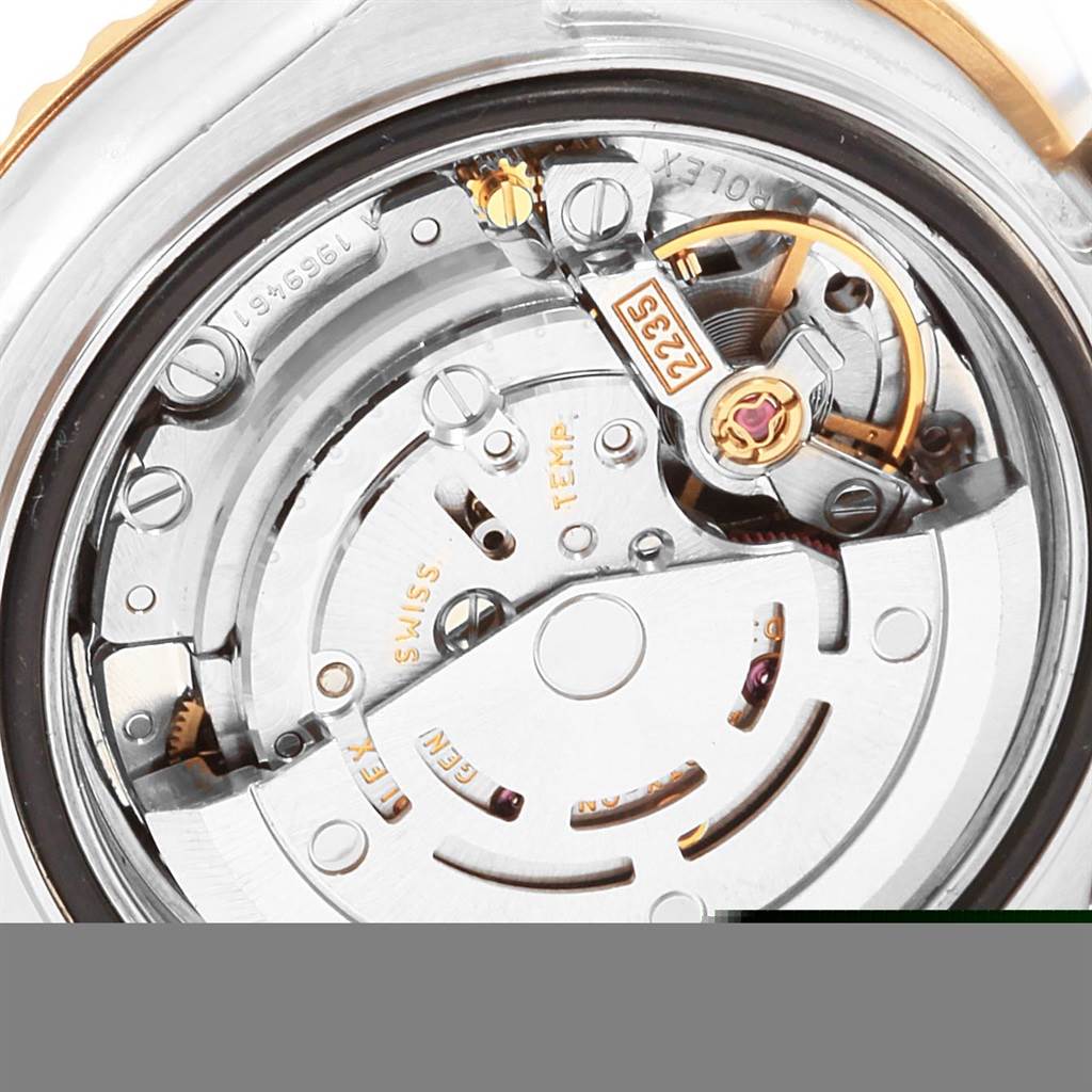 This image shows the movement mechanism and internal components of the Rolex Yacht-Master 169623 Men
s Steel and Gold (two tone) Grey Dial 169623 Men
s Steel and Gold (two tone) Grey Dial watch, viewed from the back.