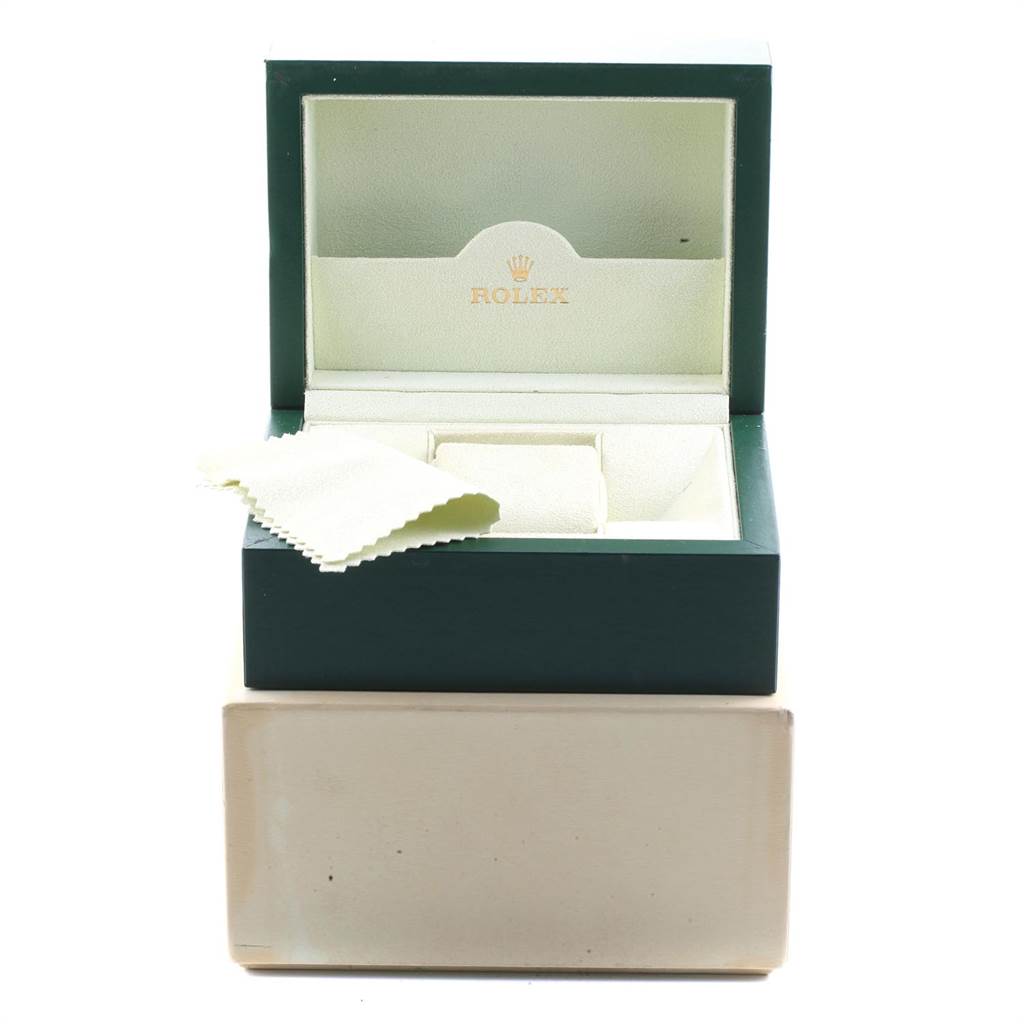 The image shows a Rolex Yacht-Master 169622 Women
s Stainless Steel Silver Dial 169622 Women
s Stainless Steel Silver Dial watch box and a cleaning cloth, captured from a slight front angle.