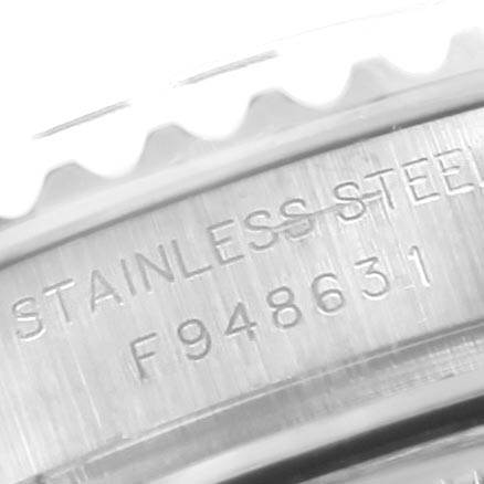 This image shows a close-up of the case back of a Rolex Yacht-Master 169622 Women
s Stainless Steel Silver Dial 169622 Women
s Stainless Steel Silver Dial watch, displaying the engraving "STAINLESS STEEL" and a serial number.
