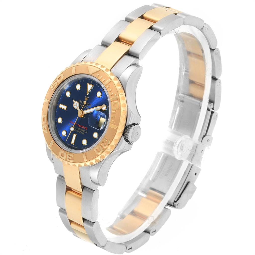 The Rolex Yacht-Master 69623 Women's Steel and Gold (two tone) Blue Dial 69623 Women's Steel and Gold (two tone) Blue Dial watch is shown at an angle highlighting the face, bezel, and part of the bracelet.