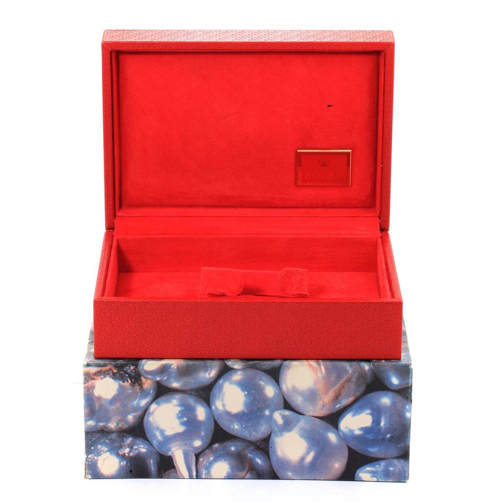 This image shows an open red box for a Rolex Yacht-Master 69623 Women's Steel and Gold (two tone) Blue Dial 69623 Women's Steel and Gold (two tone) Blue Dial watch, displaying its lid and interior.