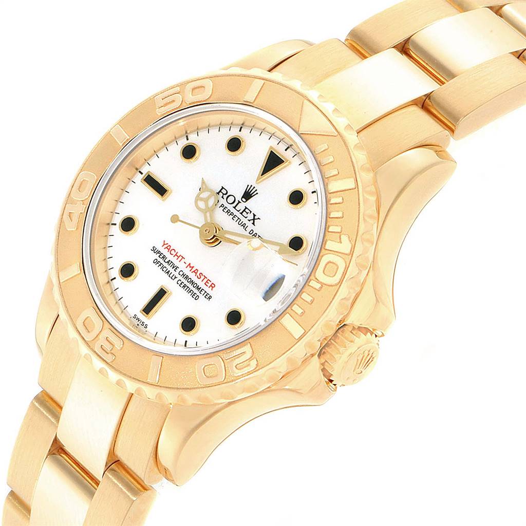 The image shows a Rolex Yacht-Master 169628 Women's Yellow Gold White Dial 169628 Women's Yellow Gold White Dial watch angled to showcase its face, bezel, and part of the bracelet.