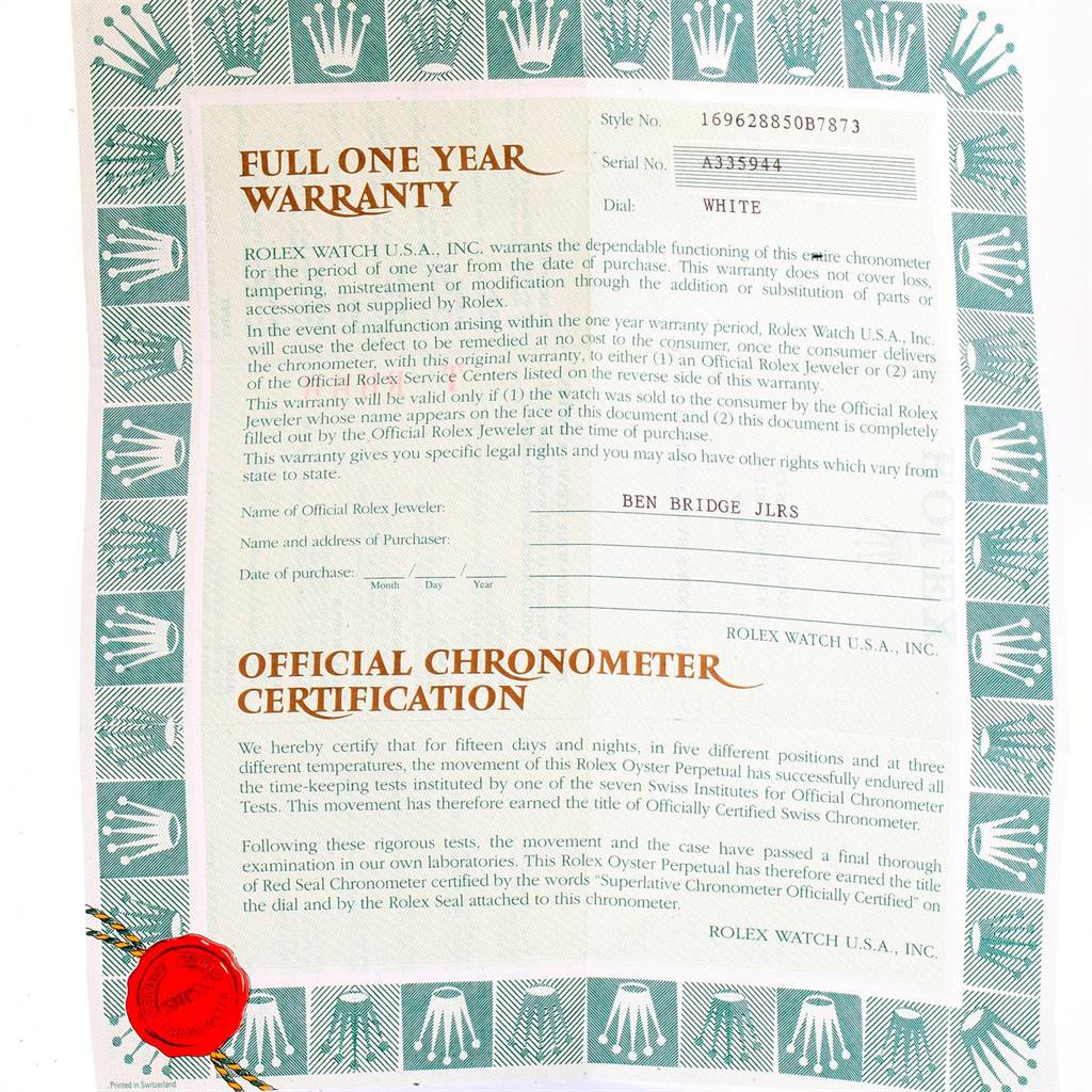 The image shows the warranty and official chronometer certification for a Rolex Yacht-Master 169628 Women's Yellow Gold White Dial 169628 Women's Yellow Gold White Dial watch model.