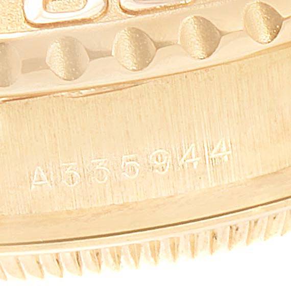 The image shows a close-up of the bezel and the engravings on the Rolex Yacht-Master 169628 Women's Yellow Gold White Dial 169628 Women's Yellow Gold White Dial watch.