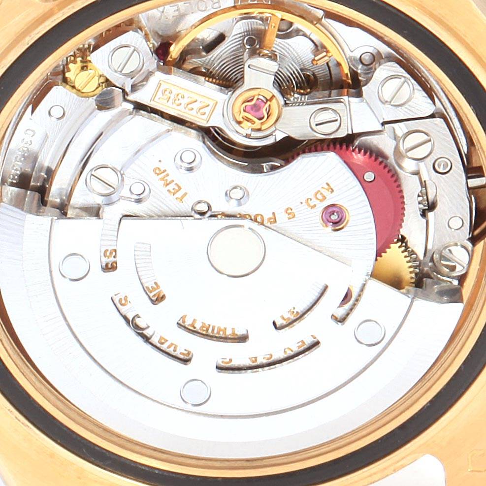 The image shows a close-up of the movement mechanism of a Rolex Yacht-Master 169628 Women's Yellow Gold White Dial 169628 Women's Yellow Gold White Dial watch.