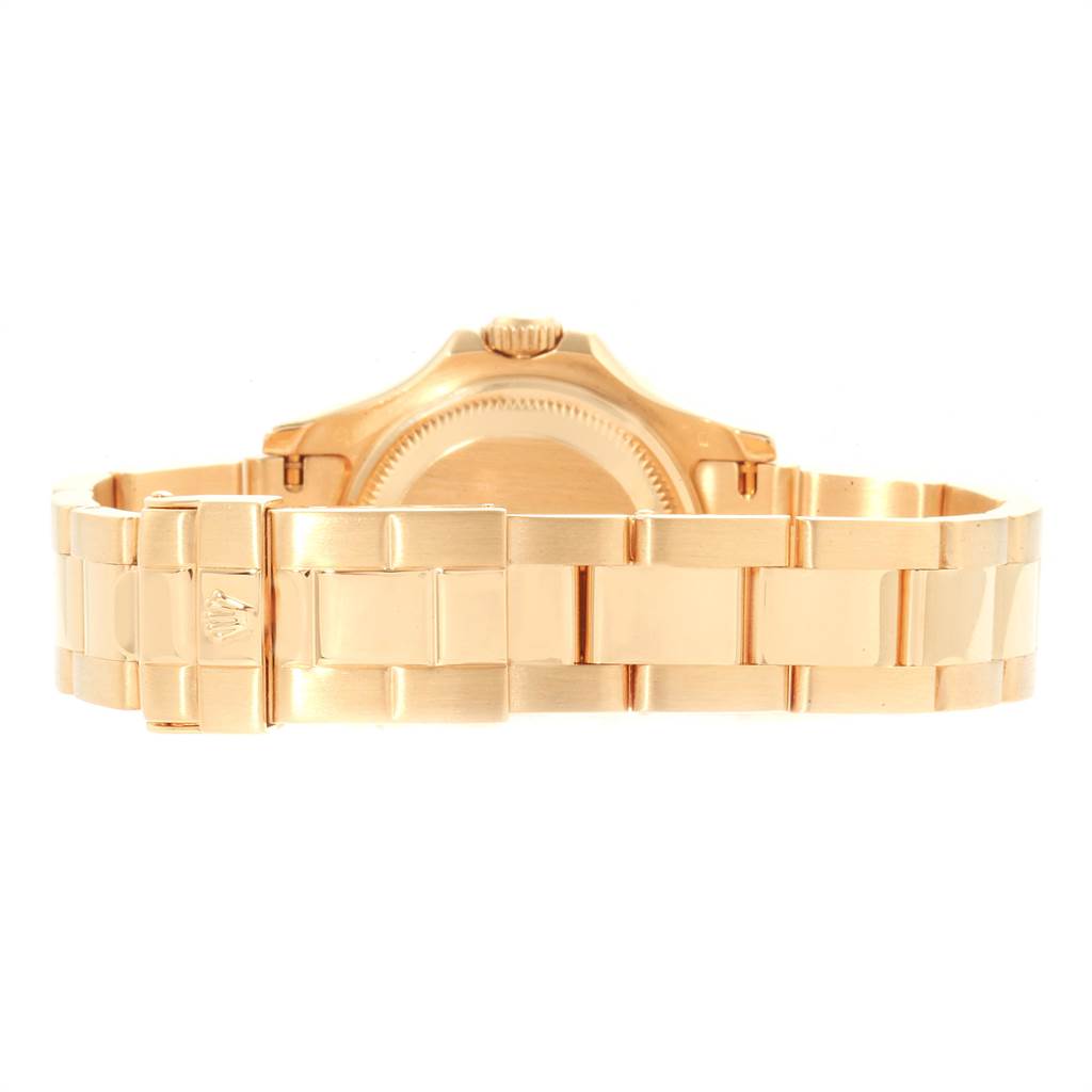The image shows the back view of a Rolex Yacht-Master 169628 Women's Yellow Gold White Dial 169628 Women's Yellow Gold White Dial watch, highlighting its gold bracelet and clasp.