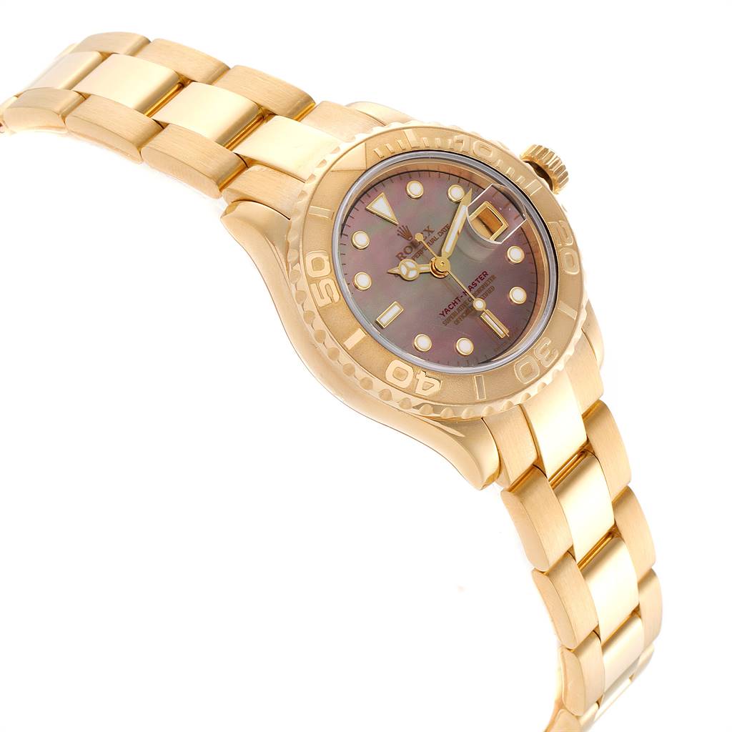 This image shows a side angle of a Rolex Yacht-Master 169628 Women's Yellow Gold Mother of Pearl Dial 169628 Women's Yellow Gold Mother of Pearl Dial watch, displaying its bracelet, bezel, dial, and crown.