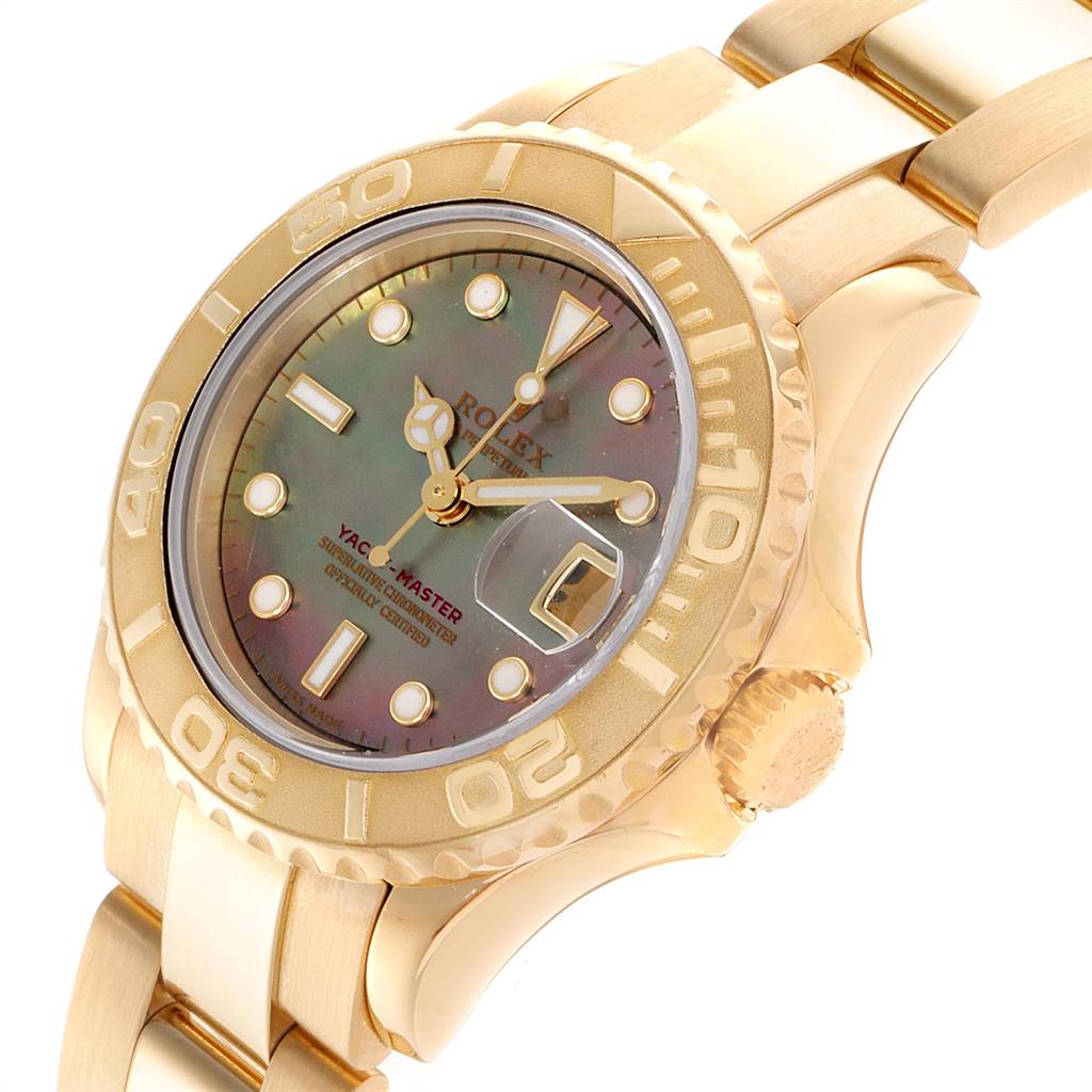 This image shows a side and angled view of the Rolex Yacht-Master 169628 Women's Yellow Gold Mother of Pearl Dial 169628 Women's Yellow Gold Mother of Pearl Dial watch, featuring its dial, bezel, crown, and part of the bracelet.