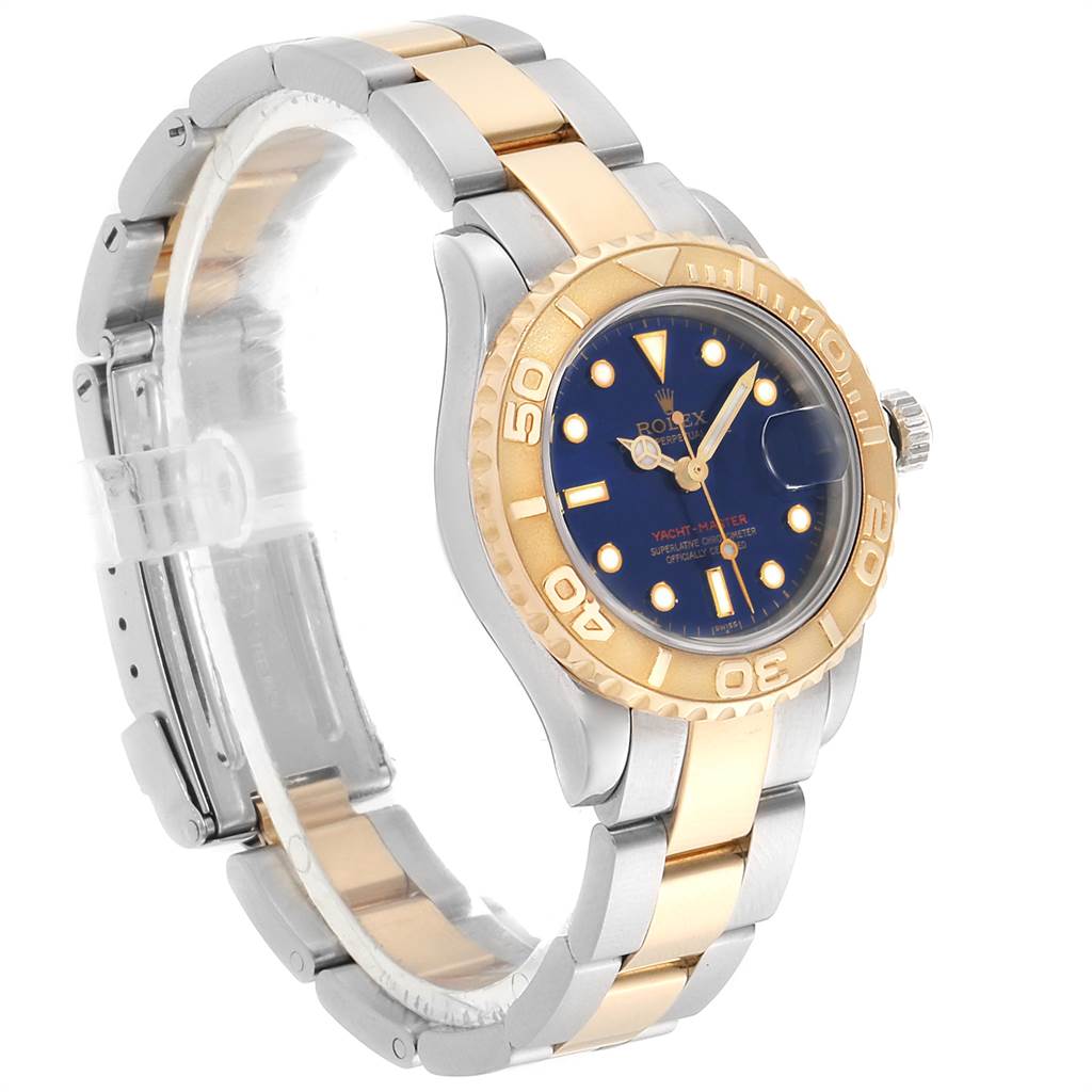 This image shows a side angle of a Rolex Yacht-Master 169623 Women's Steel and Gold (two tone) Blue Dial 169623 Women's Steel and Gold (two tone) Blue Dial watch, highlighting its gold and silver bracelet and blue dial with gold bezel.