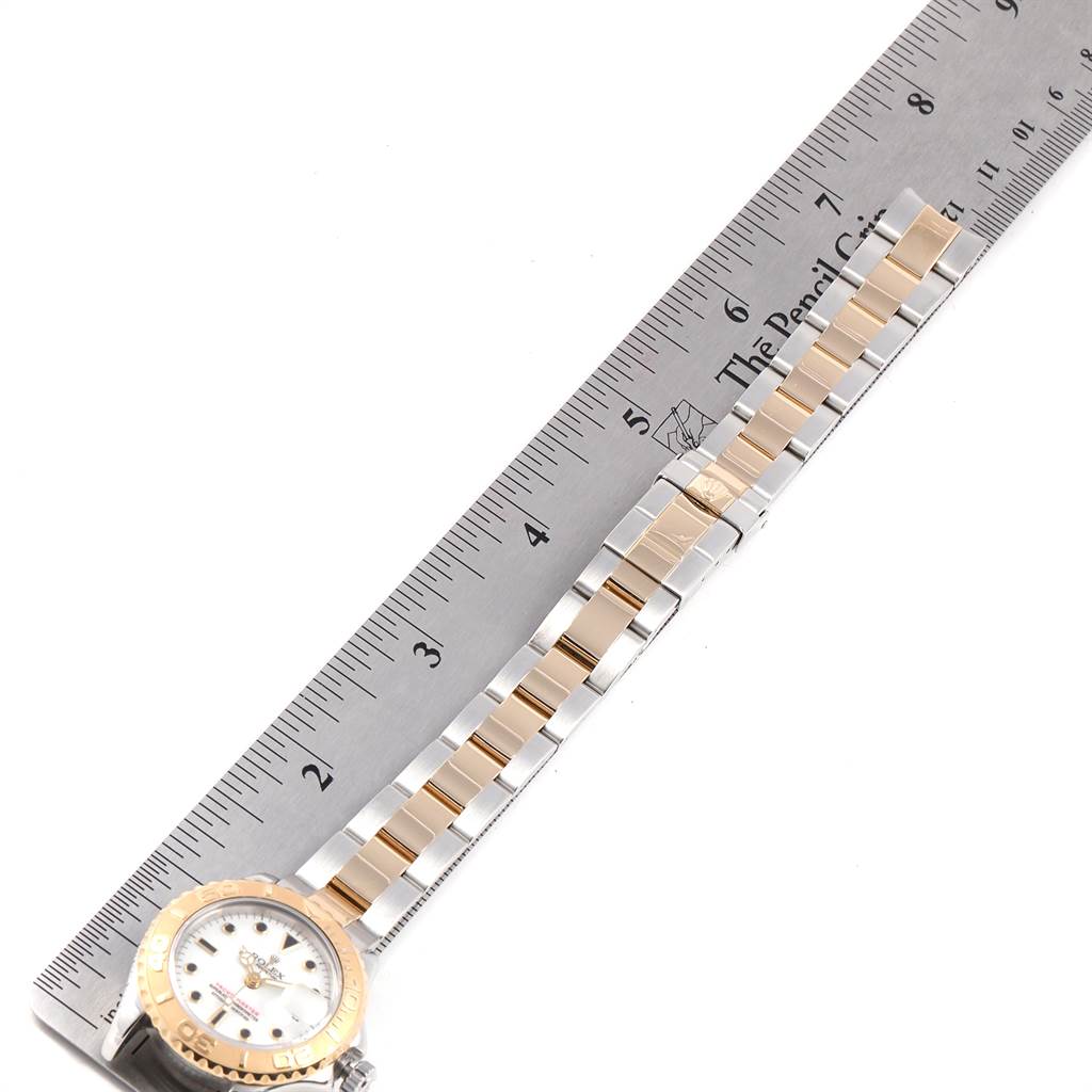 The image shows a Rolex Yacht-Master 169623 Women's Steel and Gold (two tone) White Dial 169623 Women's Steel and Gold (two tone) White Dial watch face and bracelet, measured against a ruler for length.