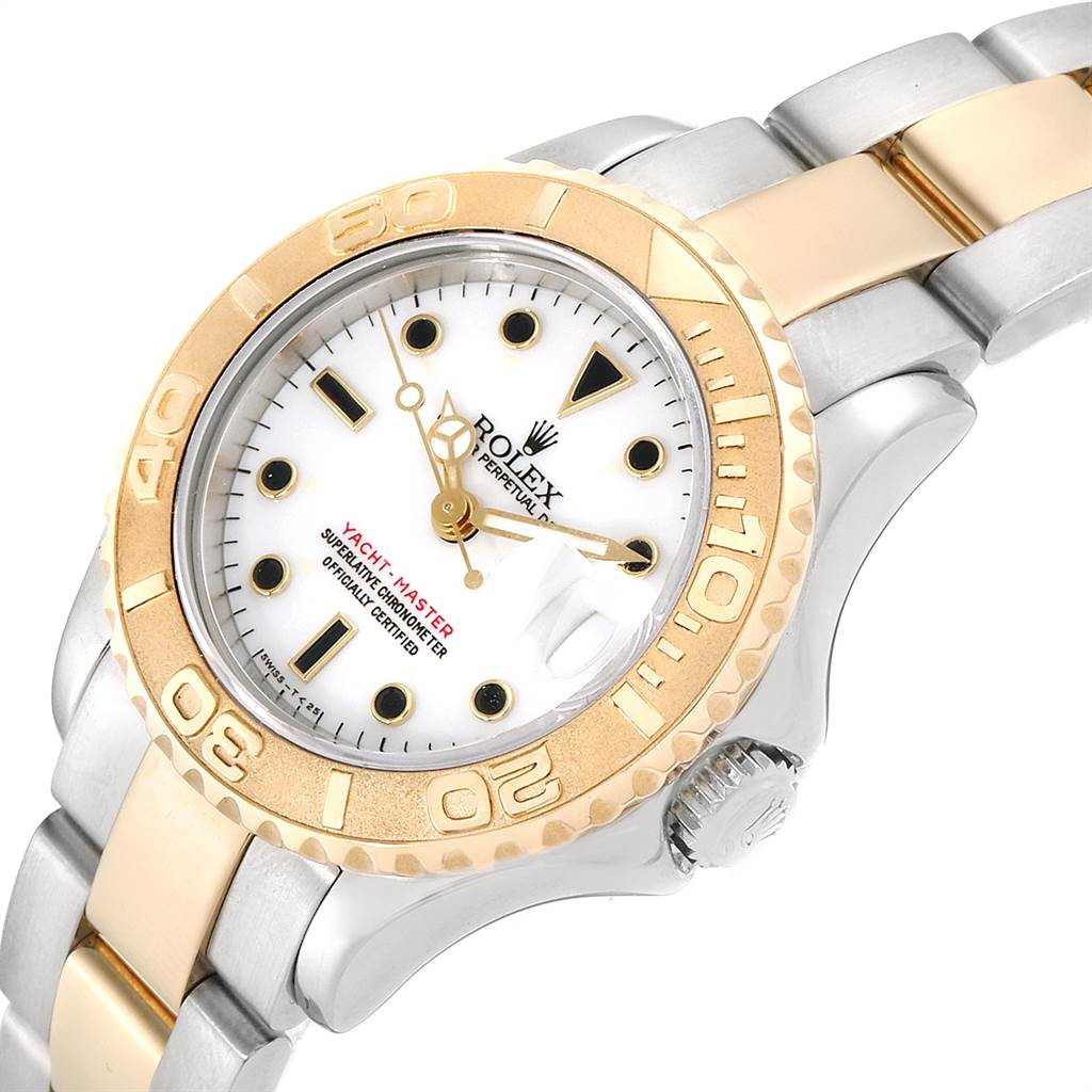 The image shows a Rolex Yacht-Master 169623 Women's Steel and Gold (two tone) White Dial 169623 Women's Steel and Gold (two tone) White Dial model watch at an angle highlighting the dial, bezel, bracelet, and crown.