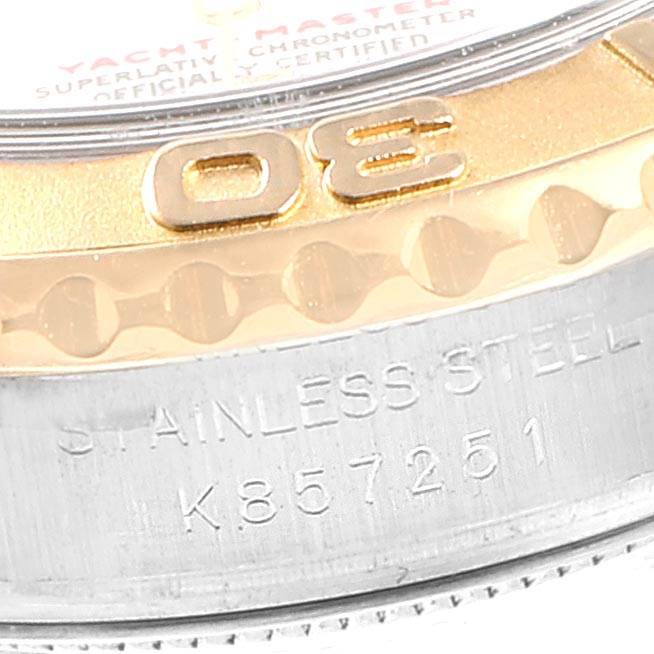 The image shows a close-up of the bezel and case of a Rolex Yacht-Master 169623 Women's Steel and Gold (two tone) White Dial 169623 Women's Steel and Gold (two tone) White Dial watch, including part of the markings.