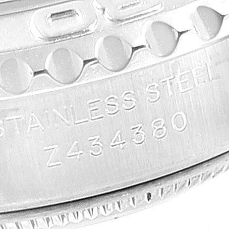 This close-up image of the Rolex Yacht-Master 169622 Women's Stainless Steel Silver Dial 169622 Women's Stainless Steel Silver Dial watch shows the stainless steel bezel with the model's serial number engraved.