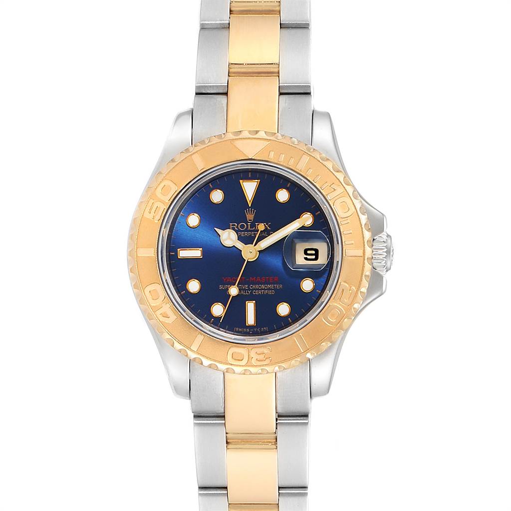 The image shows a frontal view of the Rolex Yacht-Master 69623 Women's Steel and Gold (two tone) Blue Dial 69623 Women's Steel and Gold (two tone) Blue Dial, highlighting its dial, bezel, and two-tone bracelet.