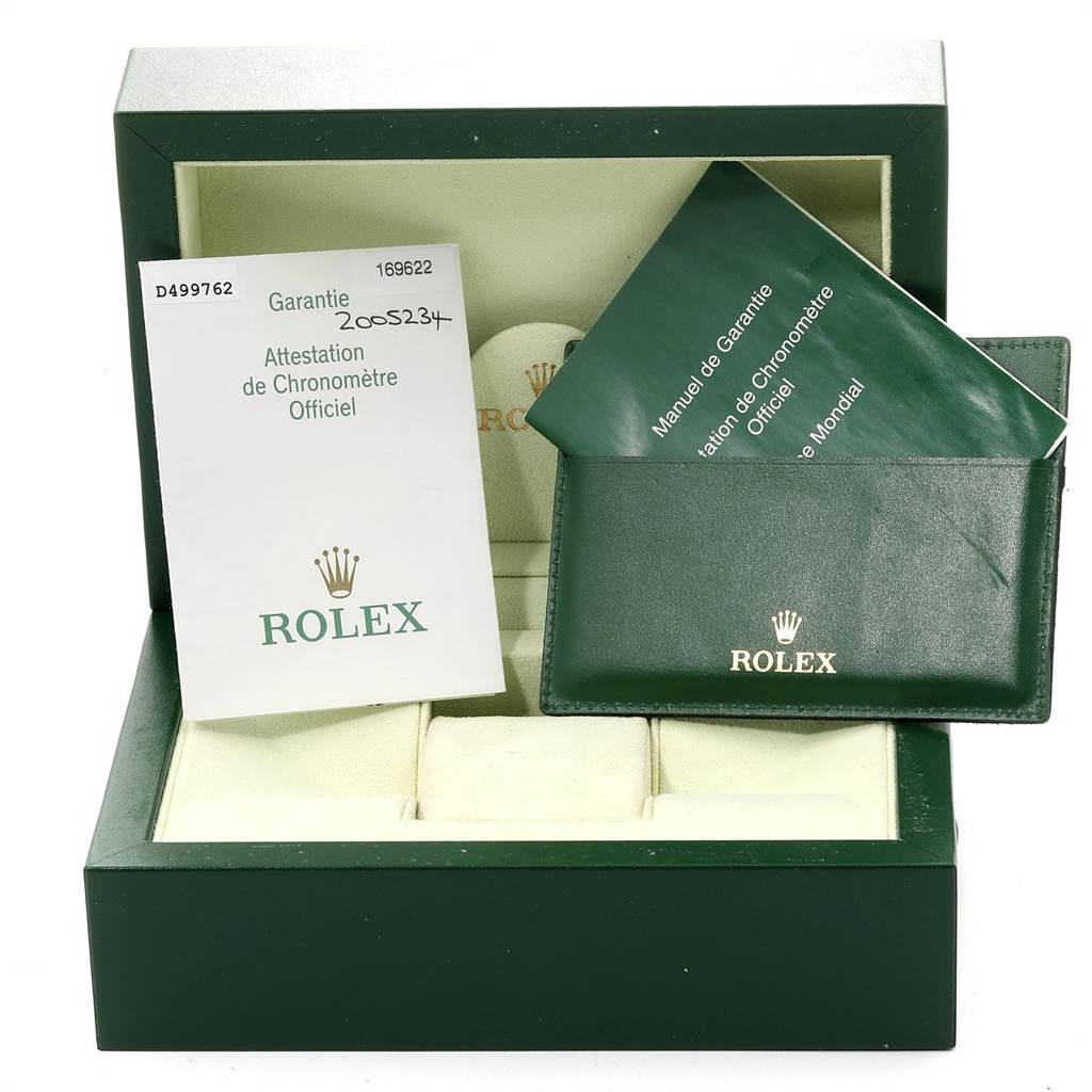 The image shows a Rolex Yacht-Master 169622 Women
s Stainless Steel Silver Dial 169622 Women
s Stainless Steel Silver Dial watch box, warranty card, manual, and green leather card holder.