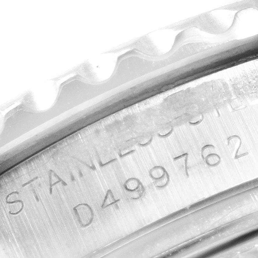 This close-up image shows the serial number and "STAINLESS STEEL" engraving on the case of a Rolex Yacht-Master 169622 Women
s Stainless Steel Silver Dial 169622 Women
s Stainless Steel Silver Dial watch.