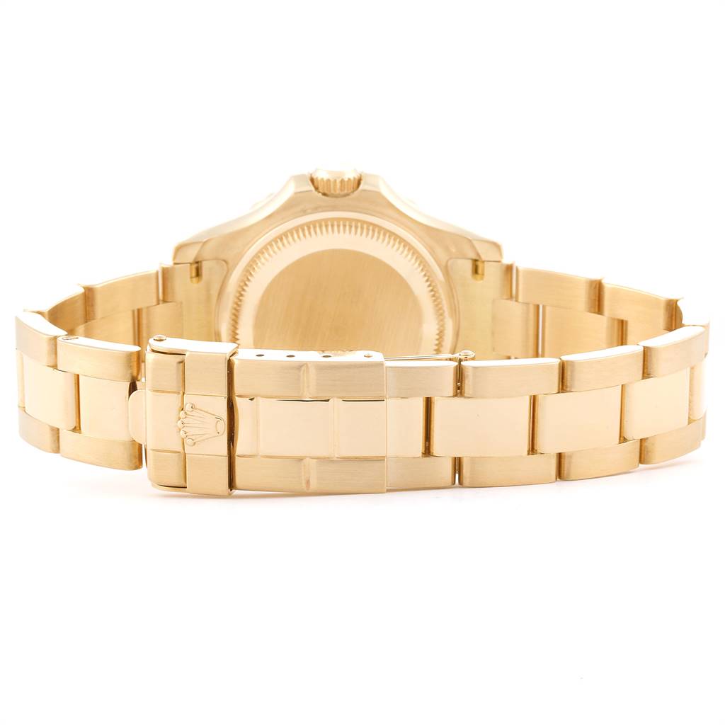 The image shows the back view of a Rolex Yacht-Master 69628 Women's Yellow Gold Champagne Dial 69628 Women's Yellow Gold Champagne Dial watch, highlighting the clasp and bracelet.