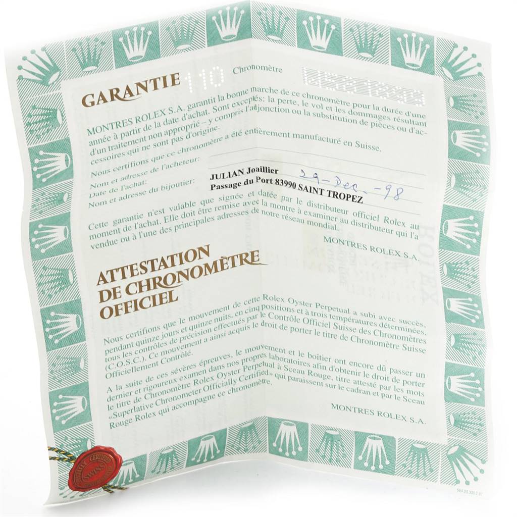 This is a warranty certificate and official chronometer certification for the Rolex Yacht-Master 69628 Women's Yellow Gold Champagne Dial 69628 Women's Yellow Gold Champagne Dial model.