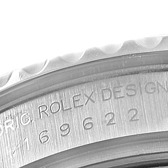 The close-up angle shows part of the bezel and case with the model number engraved on the Rolex Yacht-Master 169622 Women's Stainless Steel Silver Dial 169622 Women's Stainless Steel Silver Dial watch.